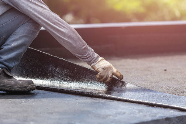 Professional Basement Waterproofing technician working in Amboy, WA